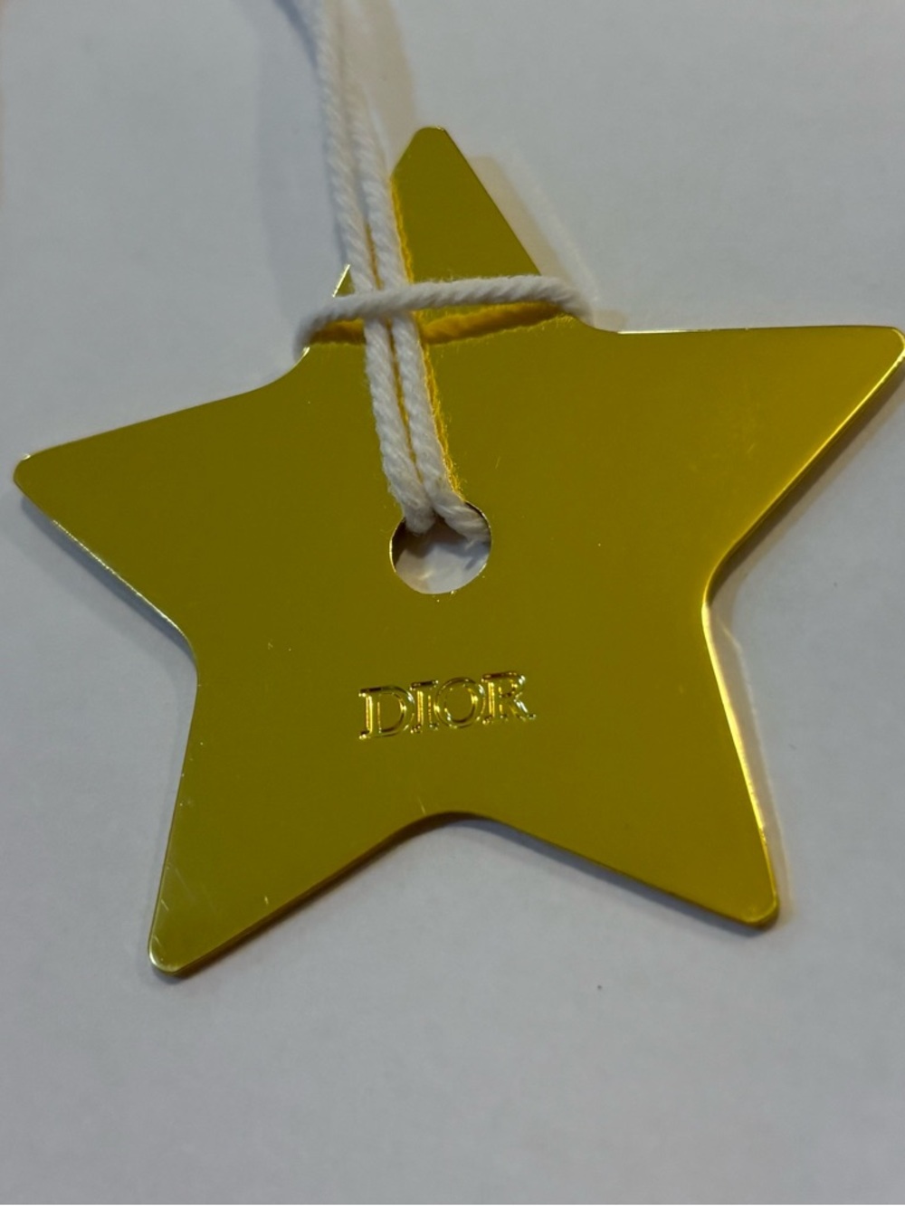 Dior Metallic Gold Star Tag with White Cord